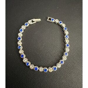 AVON Rhinestone Tennis Bracelet Bezel Set Silver Tone Blue